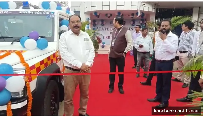 श्रावणी मेला 2026: SBI ने CSR के तहत पुलिस और यातायात प्रशासन को सौंपी एम्बुलेंस, बांटे रेनकोट व बैरिकेड्स